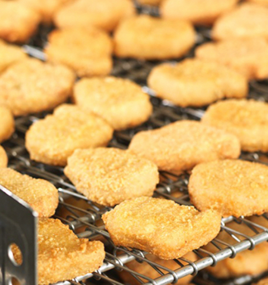 jbt-gyrocompact-60-spiral-freezer_breaded-products-e1604688035259